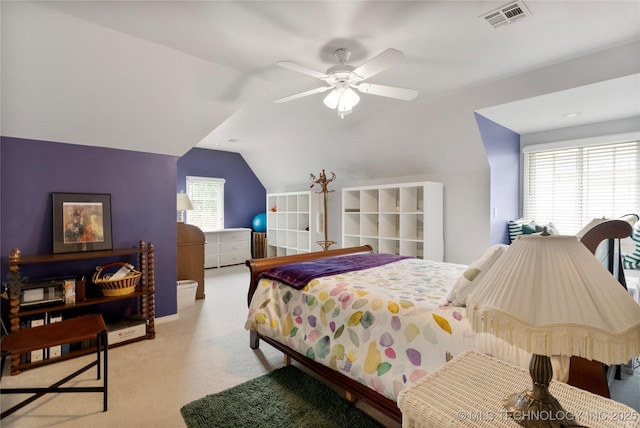 243 E 27th Pl, Tulsa, OK 74114 - carpeted bedroom with vaulted ceiling and ceiling fan