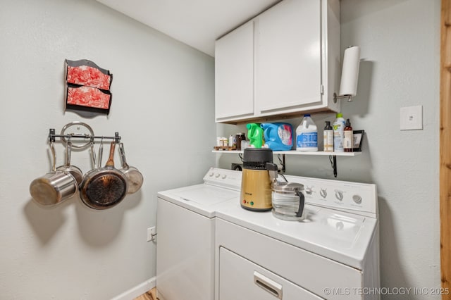 705 S E St, Skiatook, OK 74070 - laundry area featuring independent washer and dryer and cabinet space