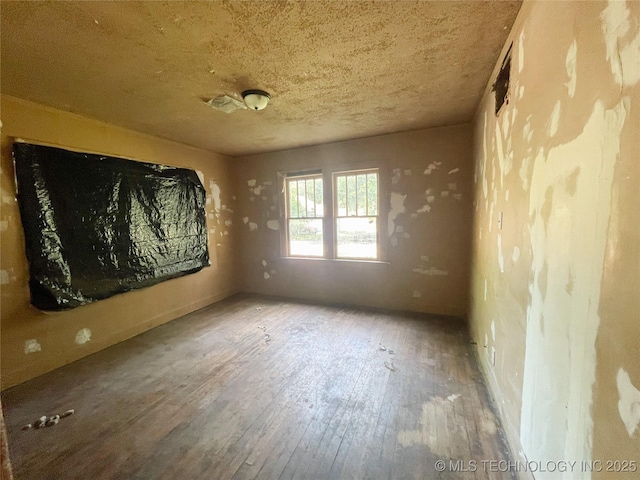 2102 Denver St, Muskogee, OK 74401 - spare room with wood-type flooring