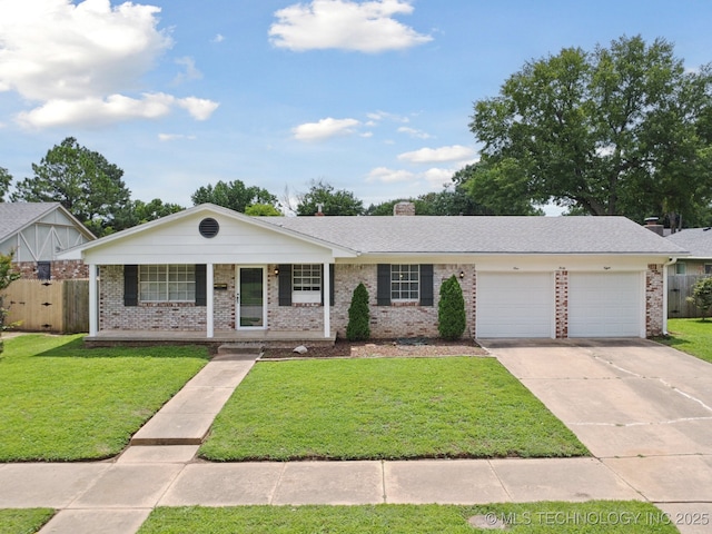 148 E 57th St, Tulsa, OK 74105 - view of front of property with brick siding, an attached garage, concrete driveway, covered porch, and a chimney