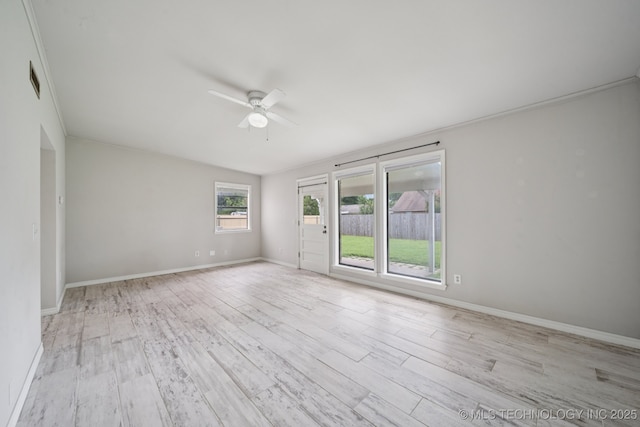 148 E 57th St, Tulsa, OK 74105 - spare room featuring ceiling fan and light wood-style floors