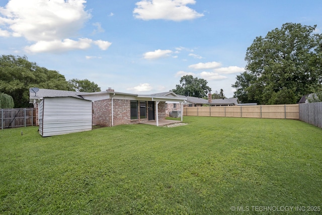 148 E 57th St, Tulsa, OK 74105 - fenced backyard with a patio area