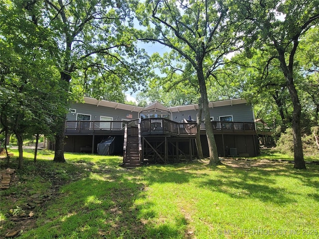 1416 Robin Hood Rd, Eufaula, OK 74432 - view of green lawn featuring a wooden deck and stairway