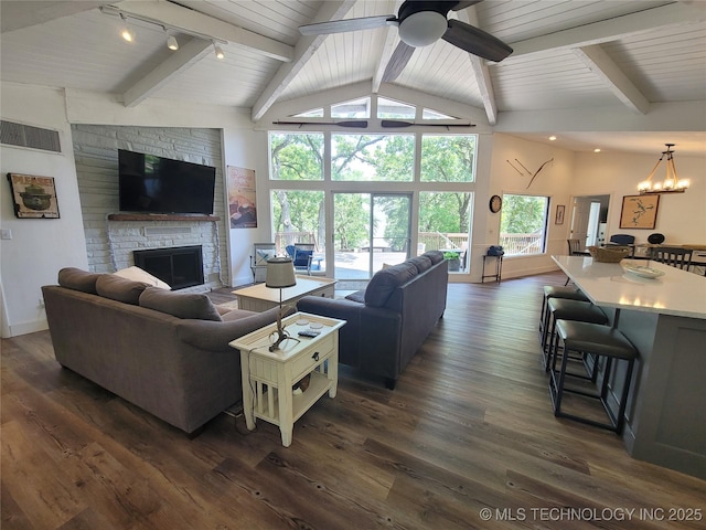 1416 Robin Hood Rd, Eufaula, OK 74432 - living area featuring a stone fireplace, a ceiling fan, a chandelier, dark wood-type flooring, and wood ceiling