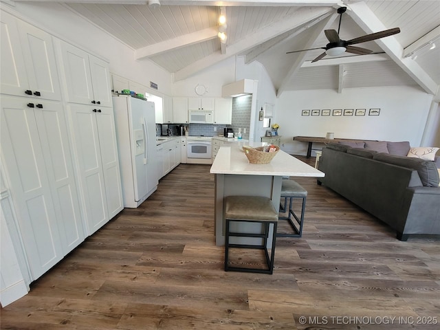 1416 Robin Hood Rd, Eufaula, OK 74432 - kitchen with white appliances, white cabinets, a kitchen bar, open floor plan, and ceiling fan