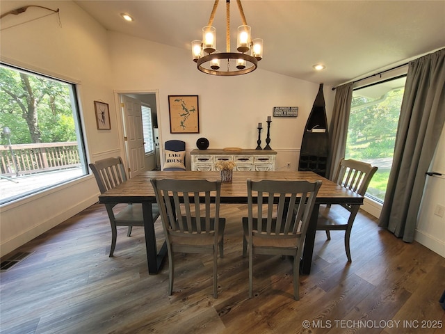 1416 Robin Hood Rd, Eufaula, OK 74432 - dining space with lofted ceiling, a chandelier, plenty of natural light, dark wood-type flooring, and recessed lighting