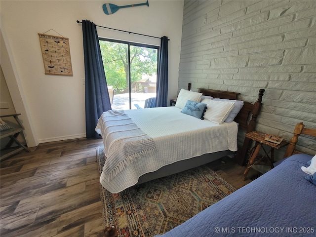 1416 Robin Hood Rd, Eufaula, OK 74432 - bedroom featuring wood finished floors and access to outside