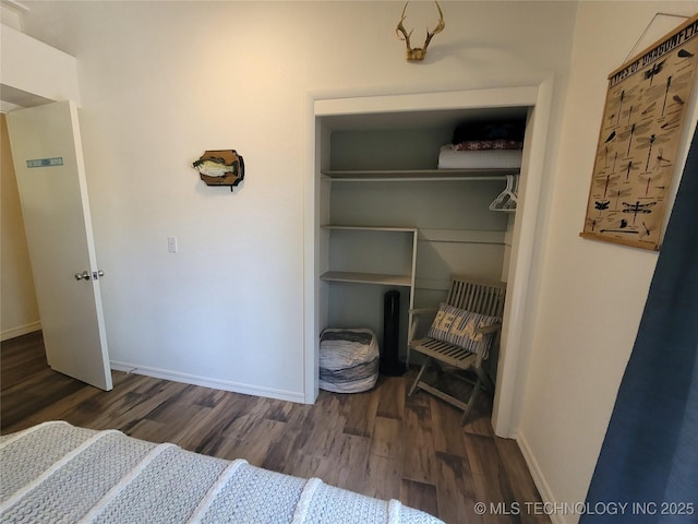 1416 Robin Hood Rd, Eufaula, OK 74432 - bedroom with wood finished floors and a closet