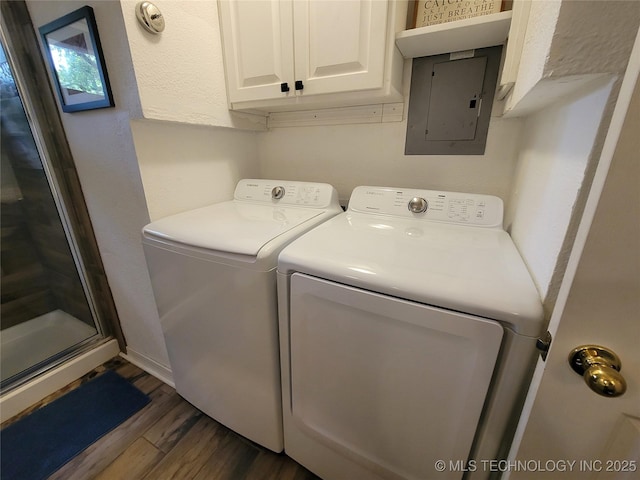 1416 Robin Hood Rd, Eufaula, OK 74432 - laundry room featuring electric panel, dark wood finished floors, and washer and dryer