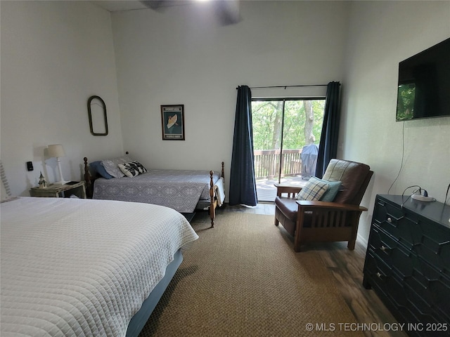 1416 Robin Hood Rd, Eufaula, OK 74432 - bedroom with access to outside, wood finished floors, and a high ceiling
