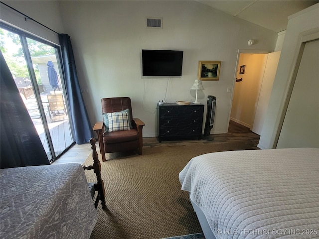 1416 Robin Hood Rd, Eufaula, OK 74432 - bedroom with vaulted ceiling and access to exterior