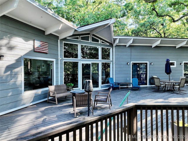 1416 Robin Hood Rd, Eufaula, OK 74432 - wooden terrace featuring outdoor dining area