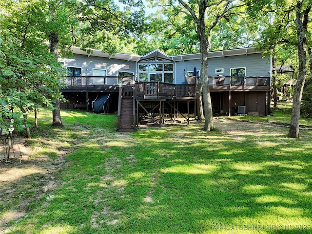 1416 Robin Hood Rd, Eufaula, OK 74432 - back of property featuring a deck, stairs, and a yard