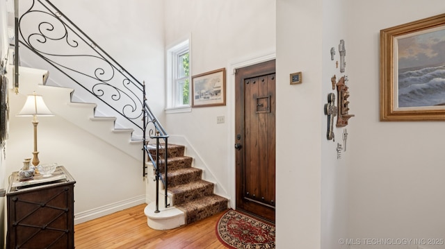 429 Kendall, Muskogee, OK 74401 - entrance foyer featuring stairway and wood finished floors