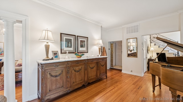 429 Kendall, Muskogee, OK 74401 - interior space with light wood-style flooring, stairs, ornamental molding, and ornate columns