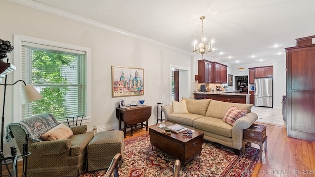 429 Kendall, Muskogee, OK 74401 - living room with crown molding, a chandelier, and light wood finished floors