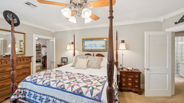 429 Kendall, Muskogee, OK 74401 - carpeted bedroom featuring crown molding, a closet, a ceiling fan, and a spacious closet