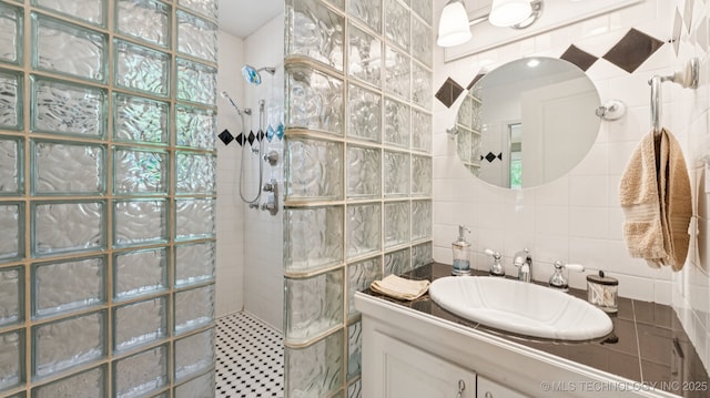 429 Kendall, Muskogee, OK 74401 - full bath with tile walls, vanity, a walk in shower, and tasteful backsplash