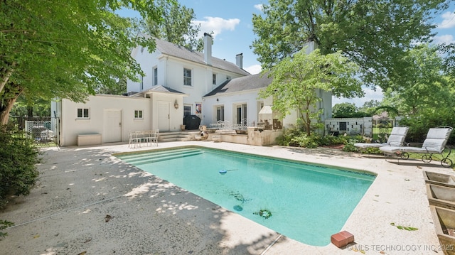 429 Kendall, Muskogee, OK 74401 - view of swimming pool featuring a patio area