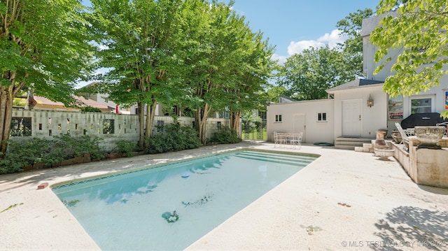 429 Kendall, Muskogee, OK 74401 - view of swimming pool with a patio area and a fenced backyard