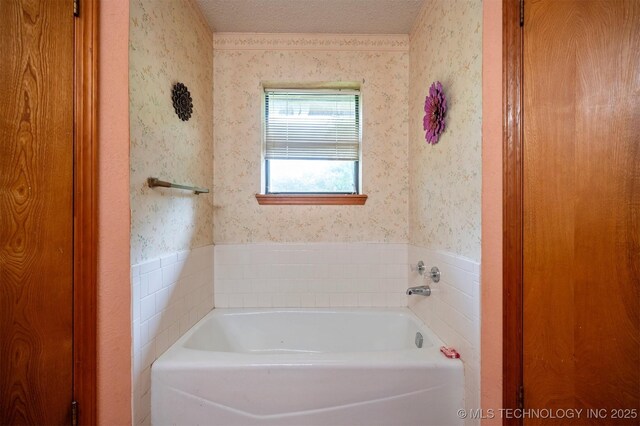 1001 E 1990th Rd, Soper, OK 74759 - bathroom featuring wallpapered walls and a garden tub