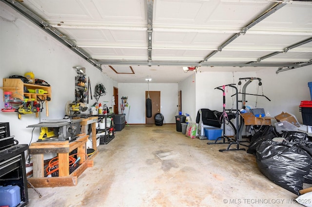1001 E 1990th Rd, Soper, OK 74759 - garage featuring a garage door opener