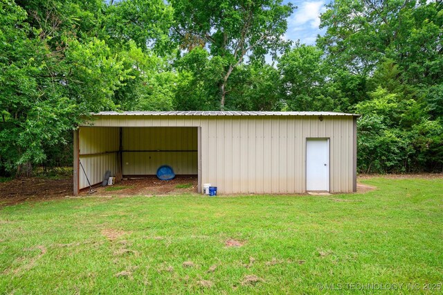 1001 E 1990th Rd, Soper, OK 74759 - view of pole building featuring a yard and a detached carport