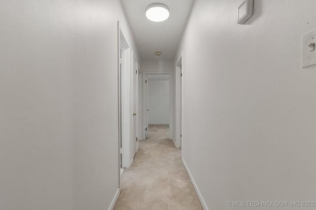 6725 E 51st Pl S, Tulsa, OK 74145 - hallway featuring light colored carpet and baseboards