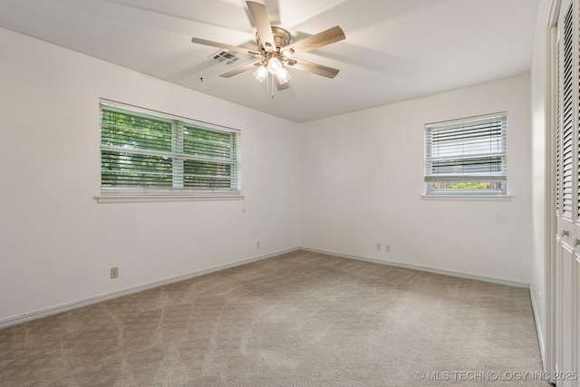 6725 E 51st Pl S, Tulsa, OK 74145 - empty room with carpet floors and a ceiling fan