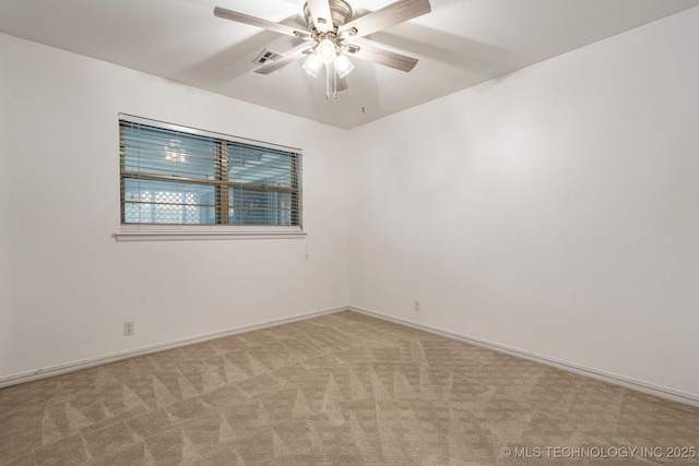6725 E 51st Pl S, Tulsa, OK 74145 - carpeted spare room featuring a ceiling fan and baseboards