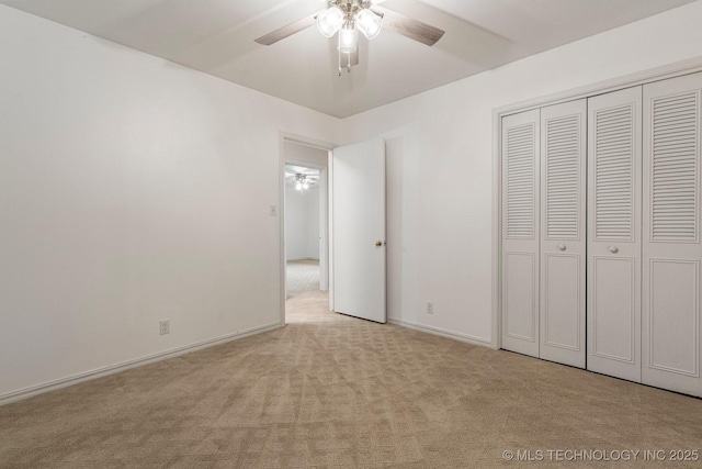 6725 E 51st Pl S, Tulsa, OK 74145 - unfurnished bedroom featuring carpet flooring, a closet, and a ceiling fan