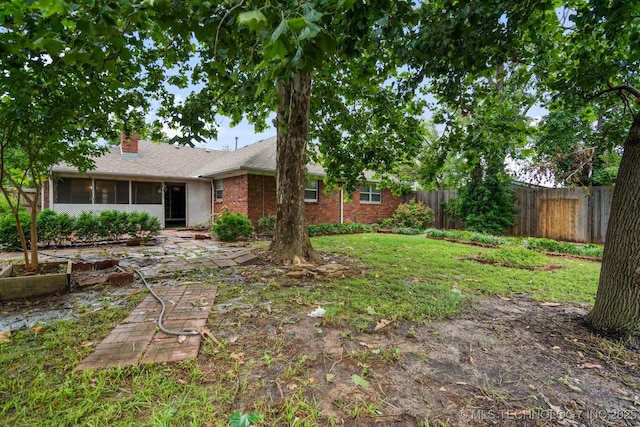 6725 E 51st Pl S, Tulsa, OK 74145 - view of yard with a sunroom