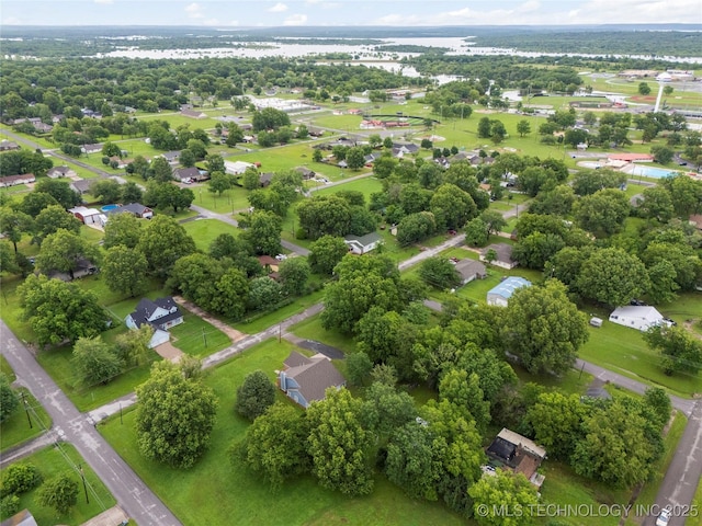 704 NE 3rd St, Wagoner, OK 74467 - aerial perspective of suburban area