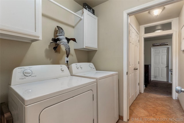704 NE 3rd St, Wagoner, OK 74467 - laundry area with cabinet space and separate washer and dryer