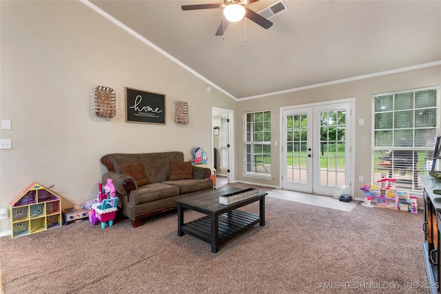704 NE 3rd St, Wagoner, OK 74467 - living room with vaulted ceiling, ceiling fan, french doors, carpet, and ornamental molding