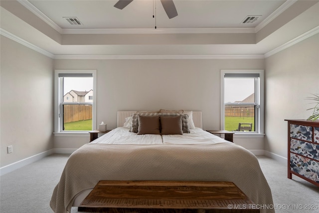 17831 S 46th E Ave, Bixby, OK 74008 - bedroom featuring a tray ceiling, light colored carpet, crown molding, and ceiling fan