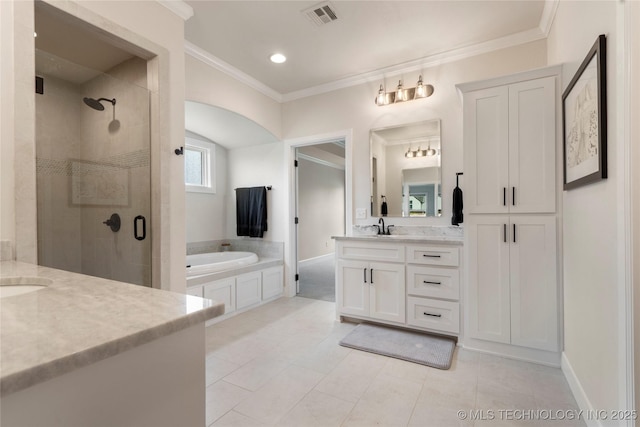 17831 S 46th E Ave, Bixby, OK 74008 - bathroom featuring two vanities, a stall shower, a bath, tile patterned floors, and ornamental molding
