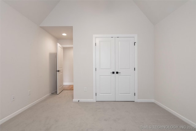 17831 S 46th E Ave, Bixby, OK 74008 - unfurnished bedroom featuring vaulted ceiling, light carpet, recessed lighting, and a closet