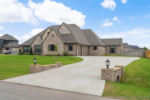 17831 S 46th E Ave, Bixby, OK 74008 - french country style house with curved driveway, an attached garage, brick siding, and a shingled roof