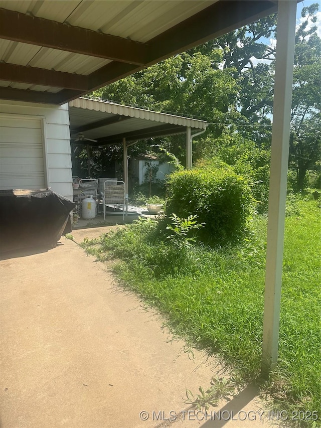 320 E Mckinley Ave, Sapulpa, OK 74066 - view of patio featuring a shed