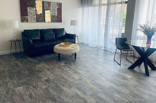 410 W 7th St Unit 229, Tulsa, OK 74119 - living room featuring wood finished floors