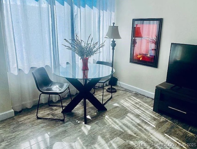 410 W 7th St Unit 229, Tulsa, OK 74119 - dining room with baseboards