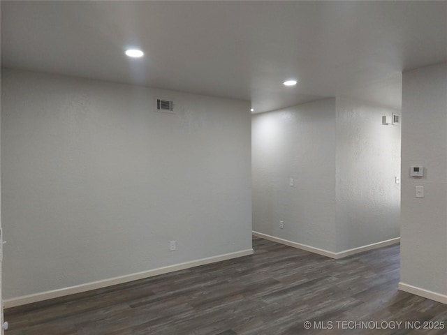 12623 E 19th St, Tulsa, OK 74128 - spare room with dark wood finished floors and recessed lighting
