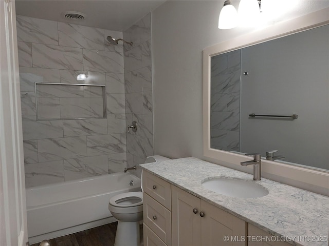 12623 E 19th St, Tulsa, OK 74128 - bathroom featuring vanity, bathing tub / shower combination, and wood finished floors