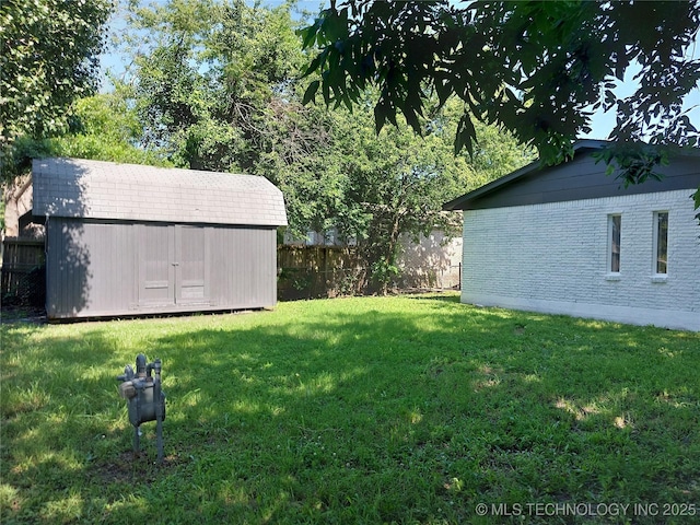 12623 E 19th St, Tulsa, OK 74128 - fenced backyard with a shed