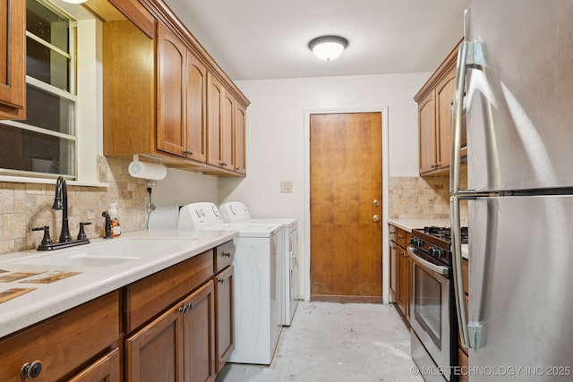 905 W Andrew Ave, Sapulpa, OK 74066 - laundry area featuring washer and clothes dryer