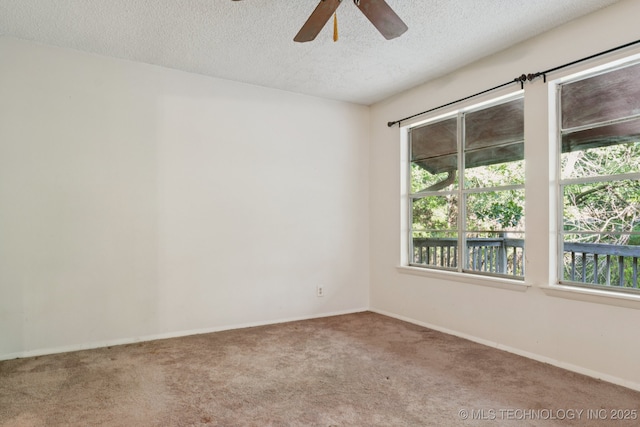 905 W Andrew Ave, Sapulpa, OK 74066 - carpeted spare room featuring a textured ceiling and a ceiling fan