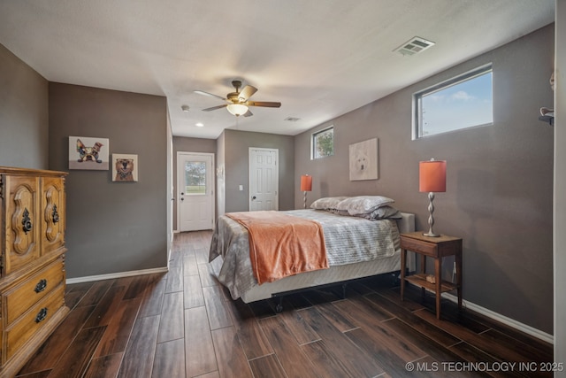 11902 N 150th E Ave, Collinsville, OK 74021 - bedroom with wood tiled floors and ceiling fan
