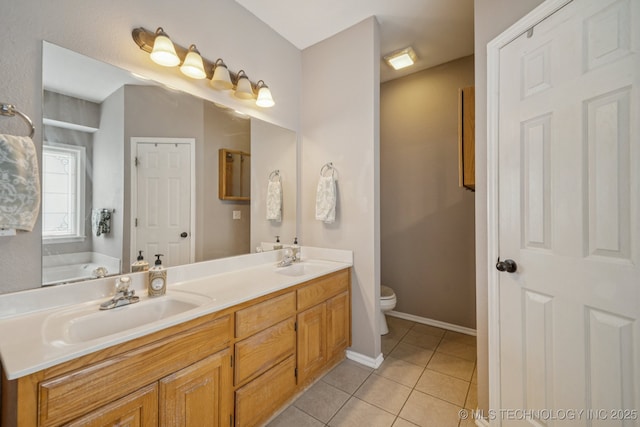 11902 N 150th E Ave, Collinsville, OK 74021 - bathroom with double vanity, tile patterned floors, and a bath