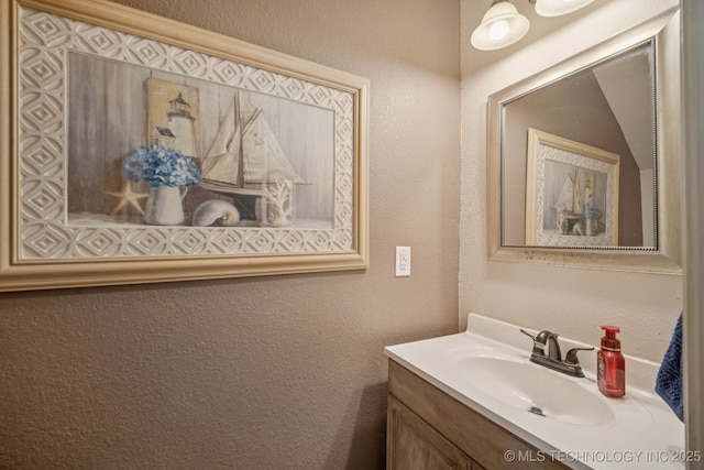 11902 N 150th E Ave, Collinsville, OK 74021 - bathroom with vanity and a textured wall
